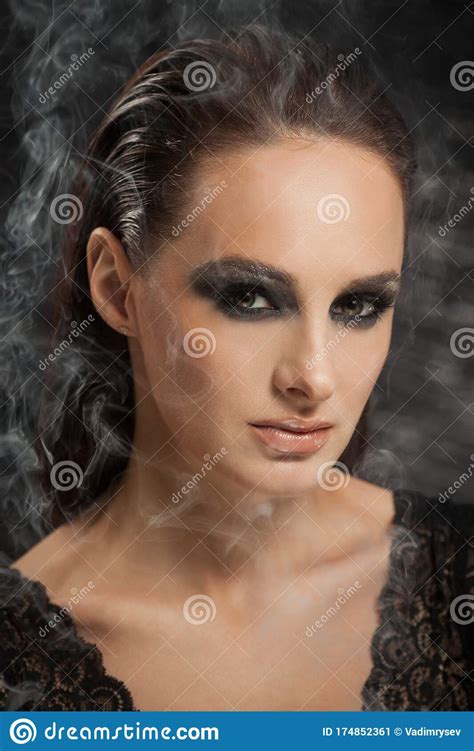 closeup portrait of a serious lady with smoky eye makeup stock image image of eyelash female