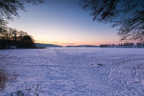 Sunset Sky Over Frozen And Snowy Lake Stock Photo Image Of Idyllic