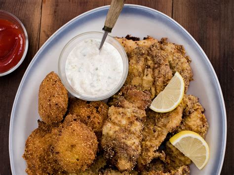 Beer battered fried cod served with fries, a side of coleslaw, and tartar sauce. Fried Catfish | Recipe | Catfish recipes, Food network recipes, Seafood recipes
