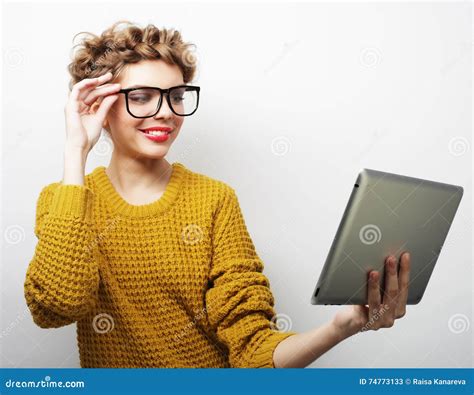 Happy Teenage Girl Wearing Glasses With Tablet Pc Computer Stock Image