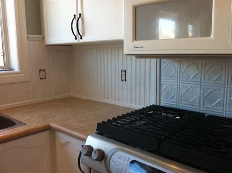 If you're going for a simple, classic vintage look, you can go for the casual beadboard paired with painted cabinets. Beadboard-Backsplash-Behind-Stove.jpg 1,024×764 pixels ...