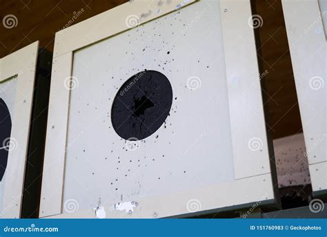 Bullseye Target With Bullet Holes In Center Close Up Gun Shooting