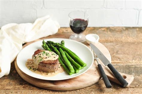 Lightly salt the steaks, then roll them in the peppercorns, pressing down the pepper into the steaks. Steak with Peppercorn Sauce (Steak au Poivre) - Eat ...