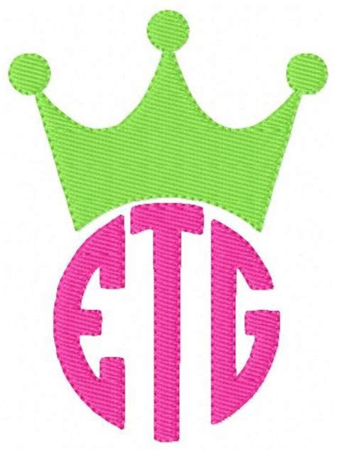 A Pink And Green Monogrammed Crown With The Letter Tg In Its Center