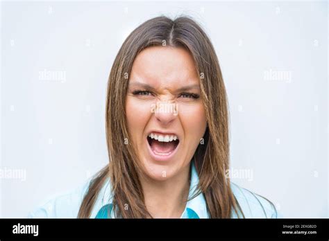 Close Up Portrait Of Angry Mad Woman Face Female Screaming Or Shouting