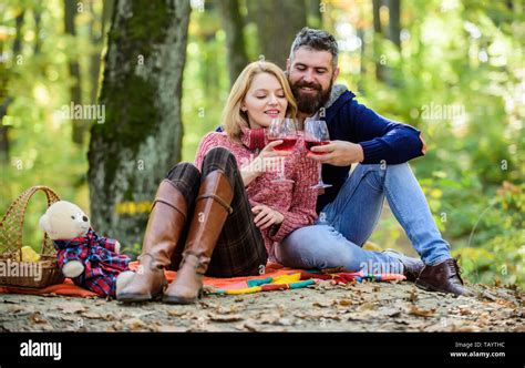 romantic picnic with wine in forest couple in love celebrate anniversary picnic date couple