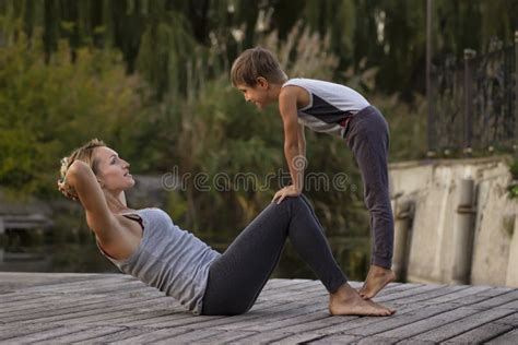 Mother And Son Exercising Yoga Pose Stock Photo Image Of Hobbies Lifestyle