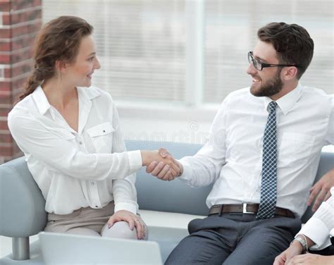 Handshake Of Manager And Client In The Office Lobby Stock Photo Image