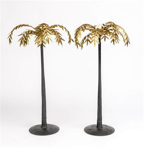 A Pair Of Gilded Palm Tree Candlesticks 20th Century 62 Cm