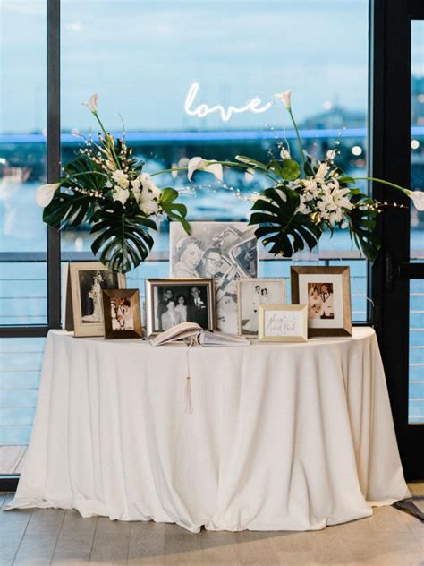 Chic And Modern Dockmaster Building Wedding Wedding Welcome Table