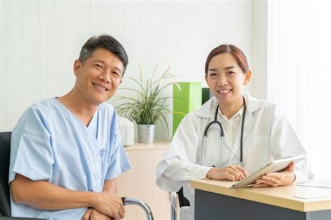 premium photo asian senior patient having consultation with doctor