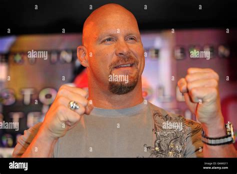 Six Time Former Wwe Champion Stone Cold Steve Austin Punches The Air At The Hmv Store In Central