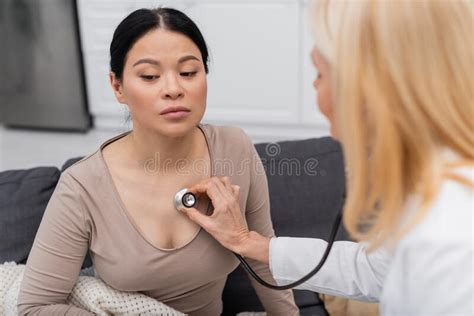 Blurred Doctor With Stethoscope Checking Lungs Stock Image Image Of