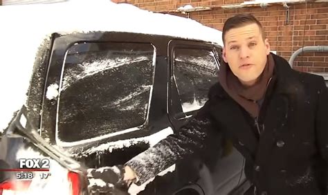 sarcastic meteorologist shows how to remove snow from vehicle video