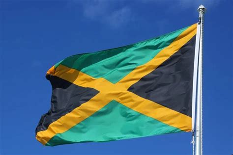 Flag Jamaica Flying High — Stock Photo © Zhukovsky 176717764