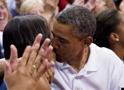 barack and michelle obama subjected to kiss cam at basketball game pictures video huffpost uk