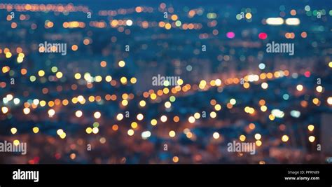 City Blurring Lights Abstract Defocused Circular Bokeh On Blue