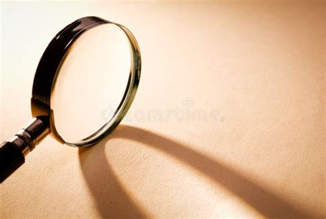 Close Up Magnifying Glass On Brown Platform Stock Photo Image Of