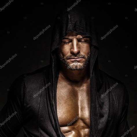 Download Portrait Of Handsome Man With Closed Eyes Wearing Hood