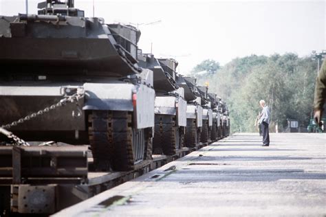 M1 Abrams Main Battle Tanks Arrive By Rail At A Prepositioning Of