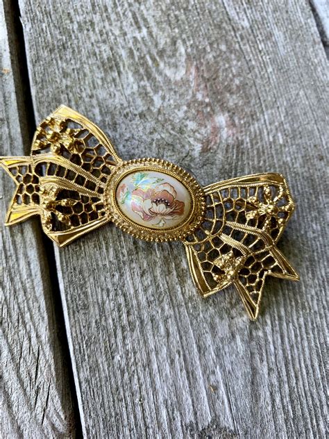 Stylish Victorian Revival Floral On Pearl Ornate Bow Lapel Pin Vintage