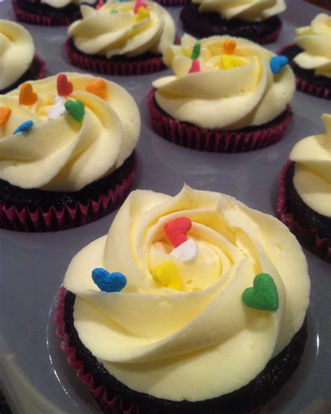 How to make chocolate mousse. Deep chocolate cupcakes topped with vanilla mousse (1 ...