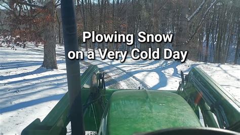 Scraping Snow Off The Driveway With A John Deere Tractor Youtube