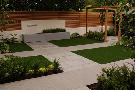 Design one works on the rule of thirds within the confines of the site, delivering two patio areas surrounded by year round colour and interest. Contemporary Minimal Garden Design - Didsbury, Greater ...