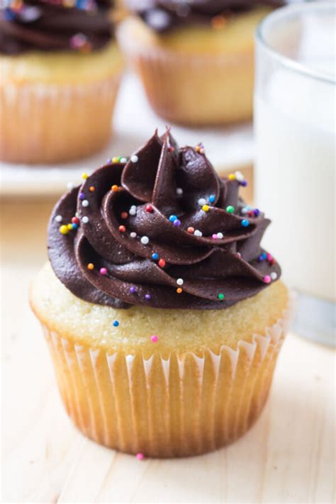 Vanilla Cupcakes With Chocolate Frosting Just So Tasty