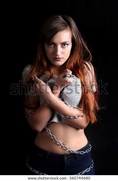 Pretty Sexy Woman Tied With Long Metal Chain