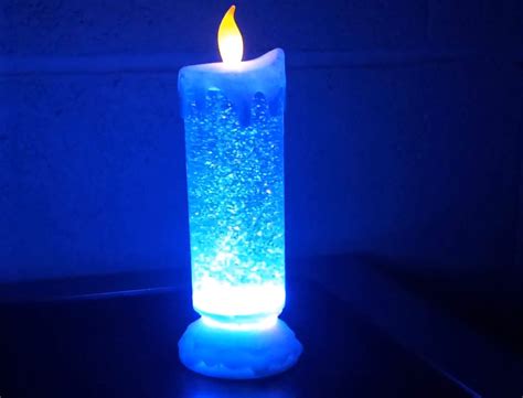 New Colour Changing Swirling Glitter Candle Light Motion Flickering