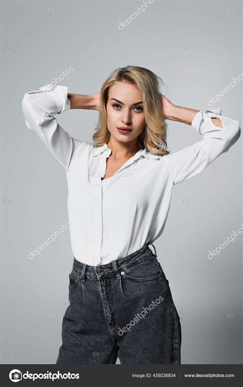 Sensual Woman White Shirt Posing Hands Head Grey Stock Photo By