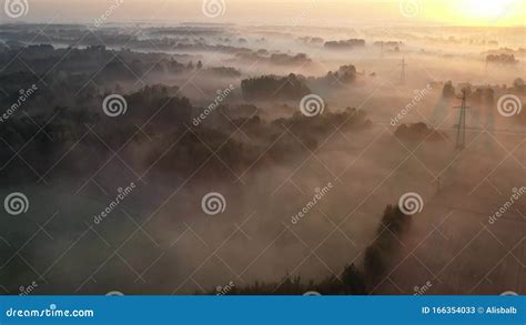 Morning Landscape With Magical Golden Fog Groves And Fields After