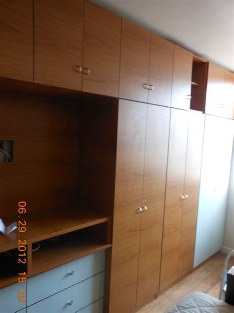 Our custom wall units are often the focal point of the living room. Custom Bedroom Wall Unit w Doors, Drawers & TV Space ...
