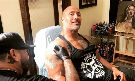 Dwayne johnson enhances bull tattoo on his arm with over 30 hours of 'pretty challenging' inking. Dwayne 'The Rock' Johnson Gets Deep on His Badass Bull ...