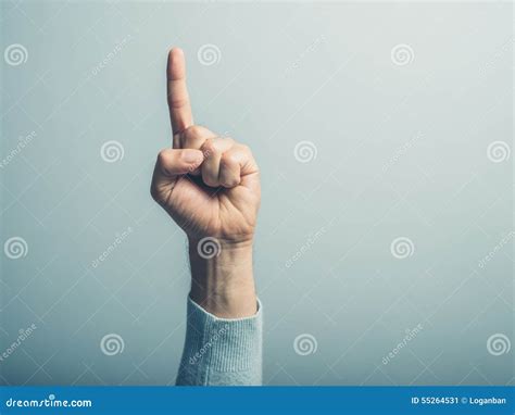 Mão Masculina Com O Dedo Que Aponta Acima Imagem De Stock Imagem De