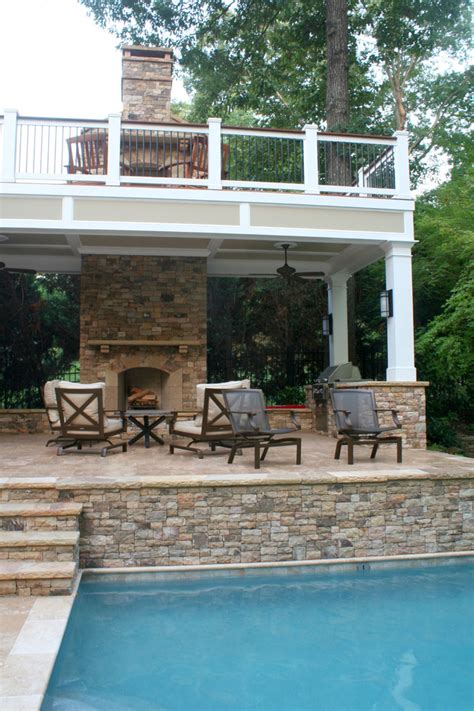 Two Story Deck With Fireplace And Pool And Spa Traditional Deck