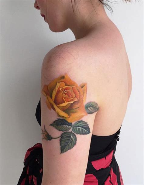 One stem rose tattoo with splashed droplets. 60 Rose Tattoos - Best Ideas and Designs for 2019