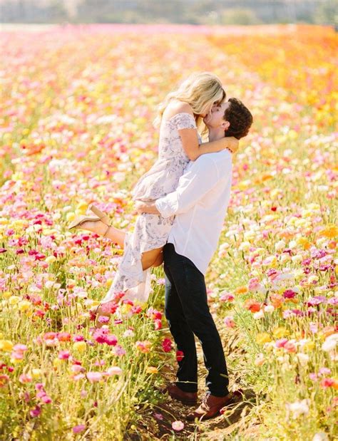 This Couple Captured Their Engagement Photos In A Flower Field Of Ranunculus Spring