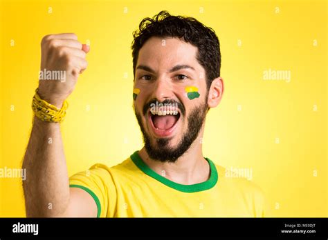 brazilian football fan emotions celebrating excited happy supporter of brazil national