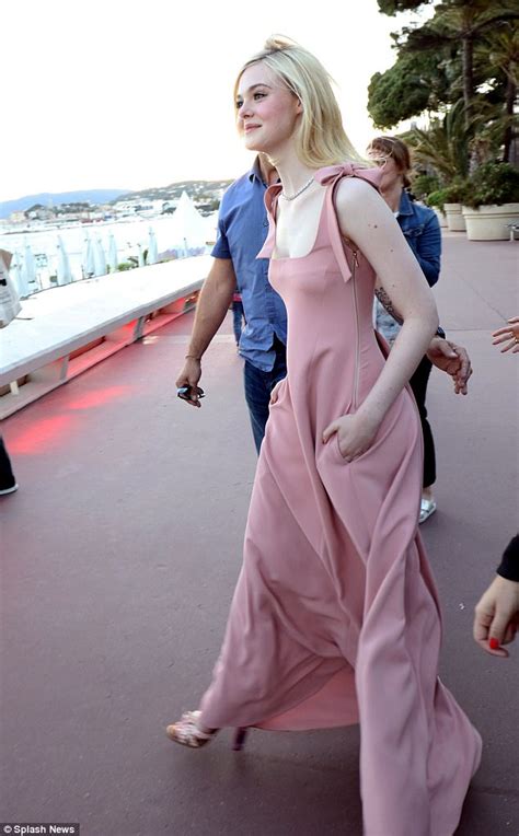 Cannes 2017 Elle Fanning Is Caught Off Guard By The Wind Daily Mail