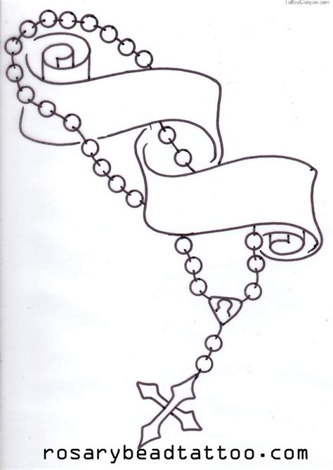 A rosebud on the hip with roman numerals looks very organic. Tattoo Designs Tagged As Cross With Rosary Beads Picture ...