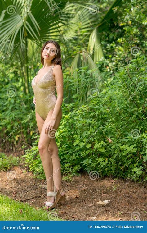 Beautiful Woman Posing Full Body In A Nature Scene Stock Image Image