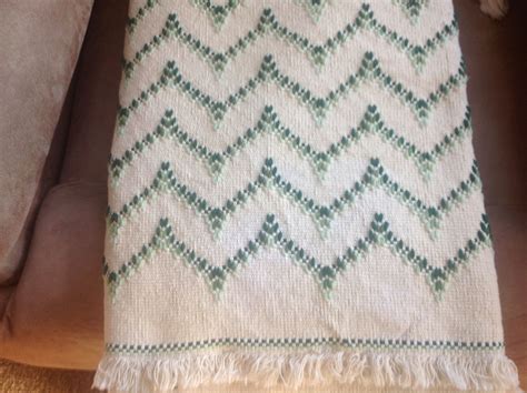 Closeup Of Heartbeat In Greens Swedish Weaving Patterns
