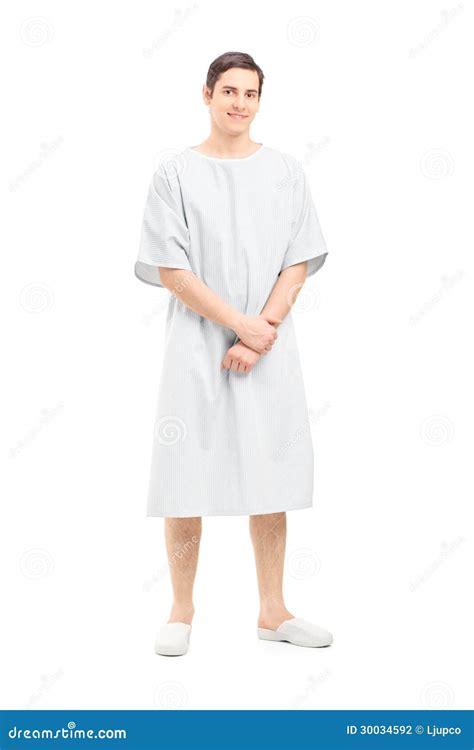 Full Length Portrait Of A Male Patient In A Hospital Gown Stock Photo