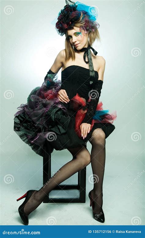 Young Model In Carnaval Dress With Creative Make Up Stock Photo