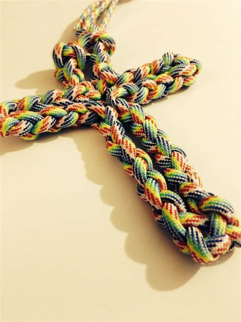 Four strand round braid paracord lanyard using braiding disk. Four strand round braid cross. This still needs a little work might add a Turks head knot to ...