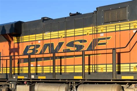 Bnsf Locomotive With Corporate Logo On Side In Company Color Scheme