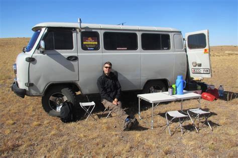 Want to see your potential savings? Lunch by the Russian Van in The Gobi | Photo