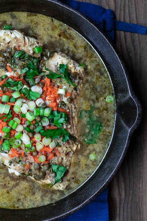 Lightly sprinkle the halibut and vegetables with a little more seasoned salt. Mediterranean Wine-Lemon Poached Halibut | The ...